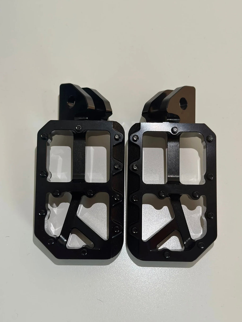 Black foot pegs
