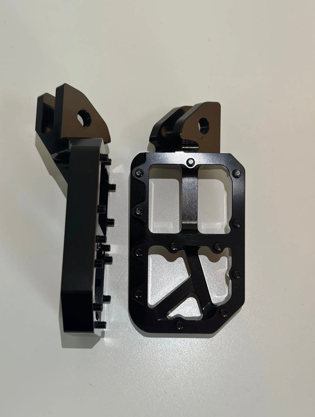 Black foot pegs