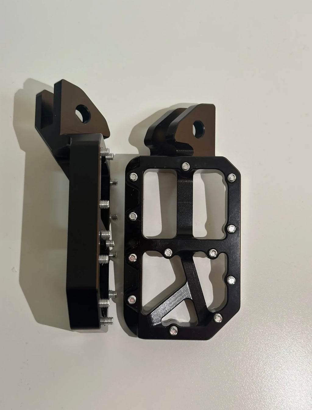 Black foot pegs