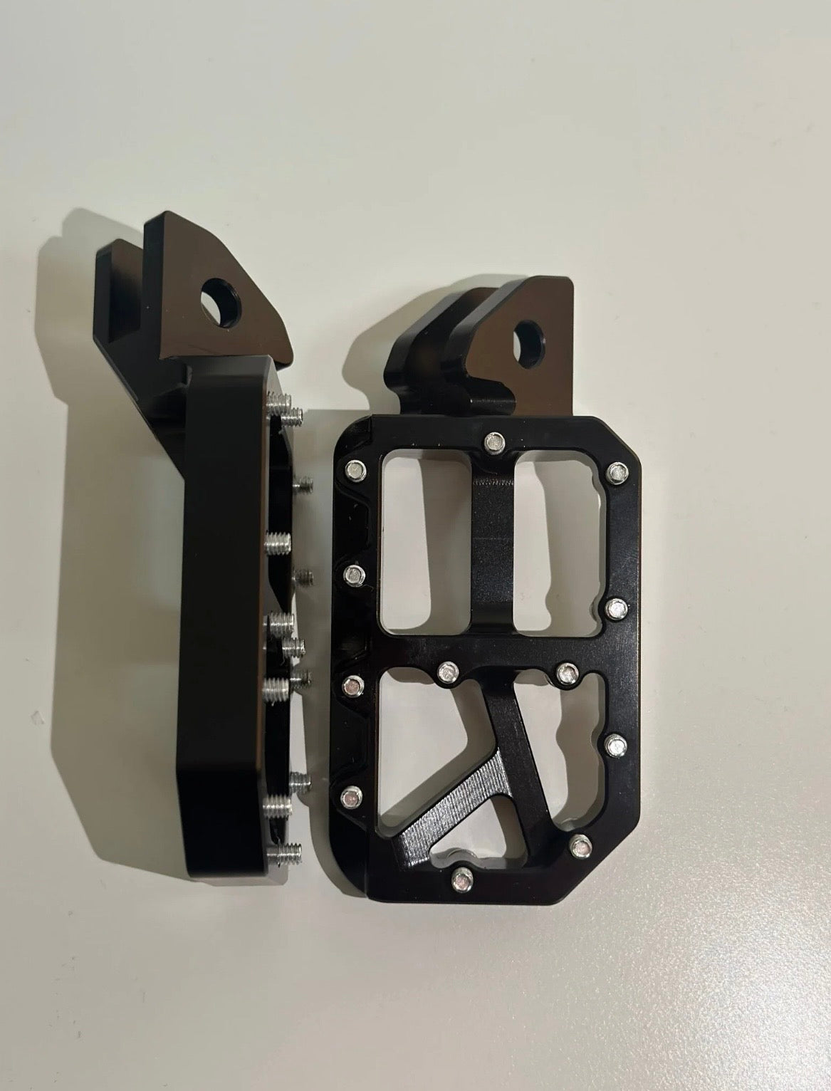 Black foot pegs