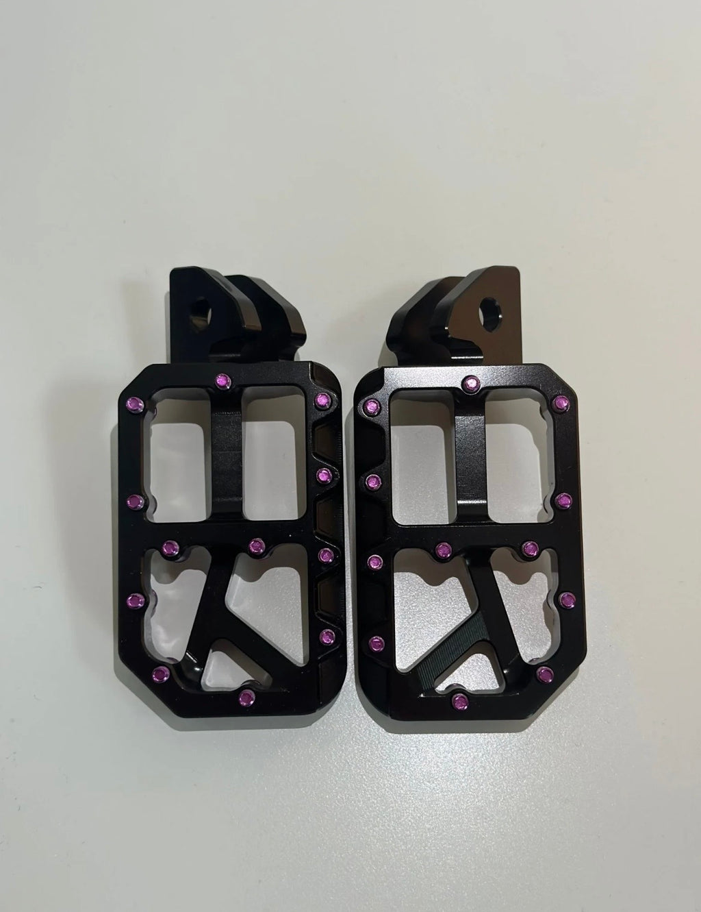Black foot pegs