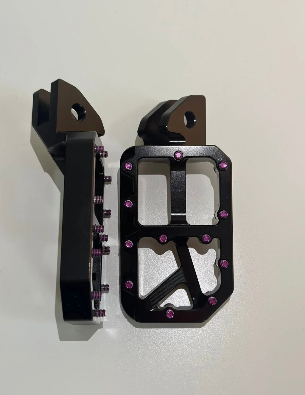 Black foot pegs