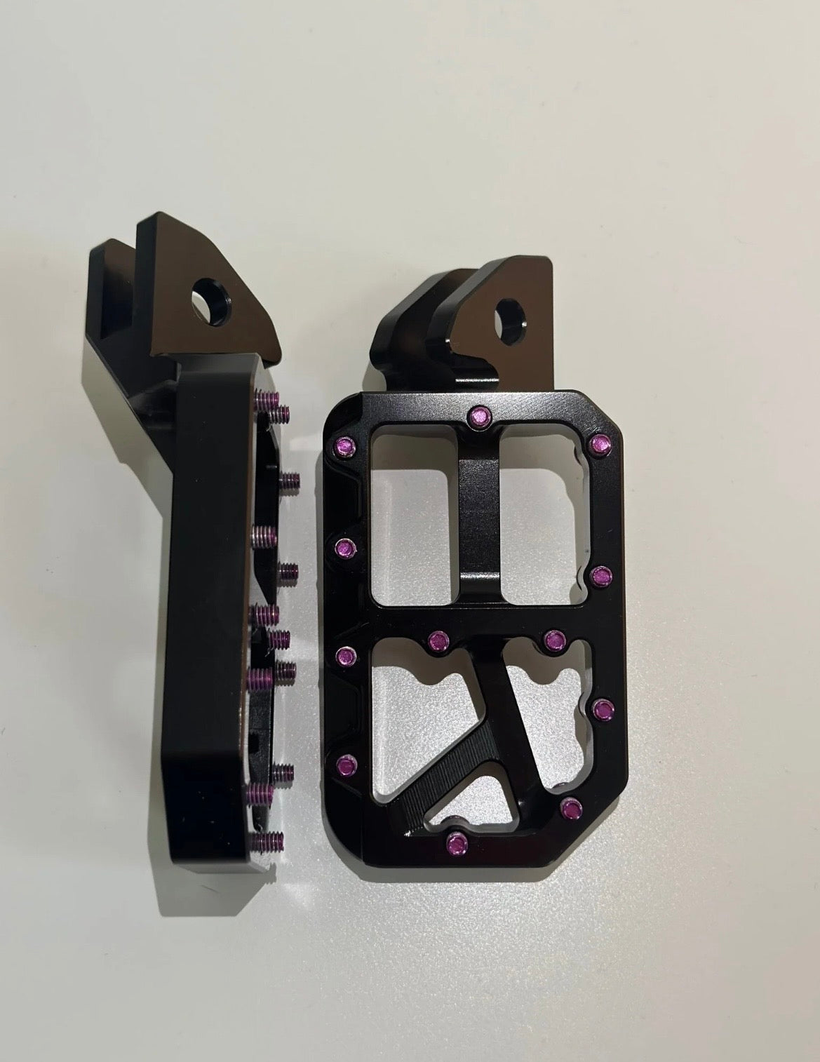 Black foot pegs