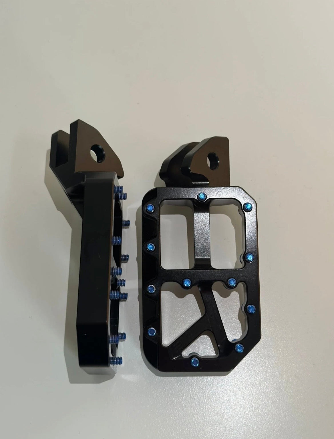 Black foot pegs